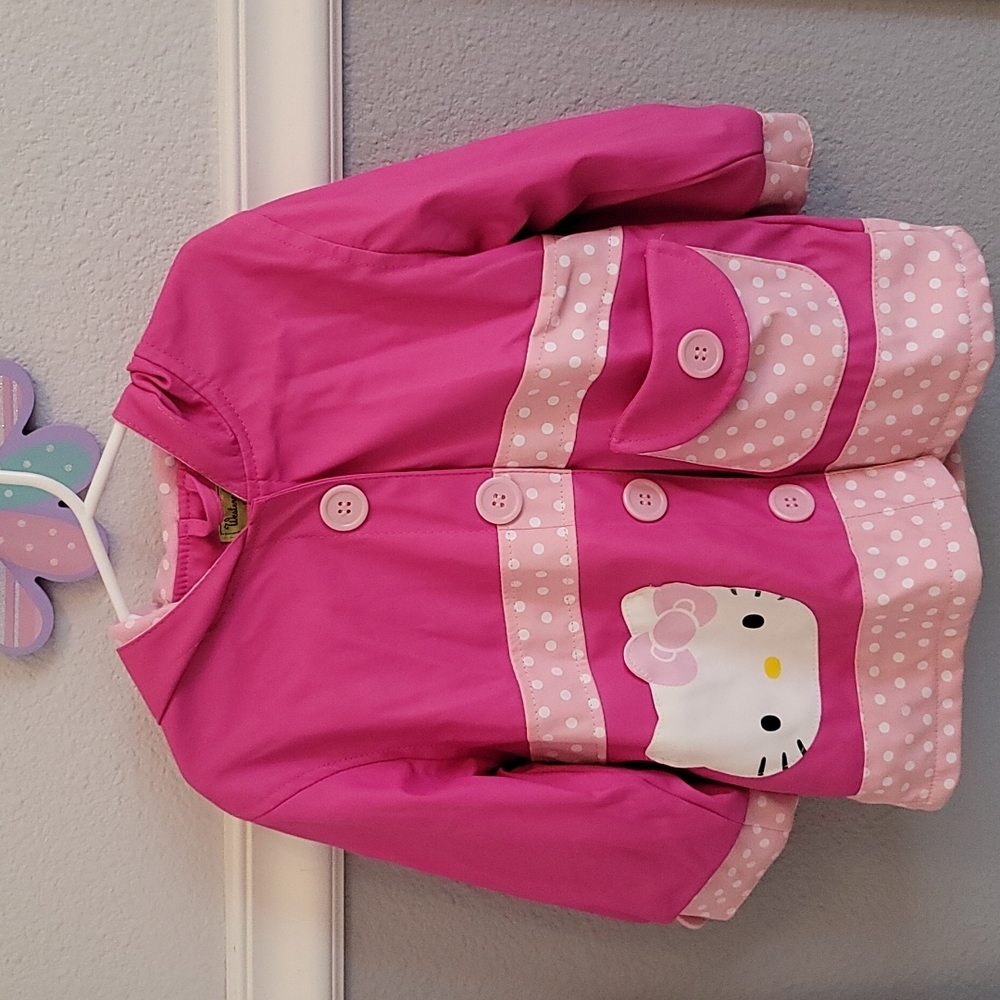 New, Adorable Girls Hello Kitty Raincoat in Size 3T, pink color with polkadots